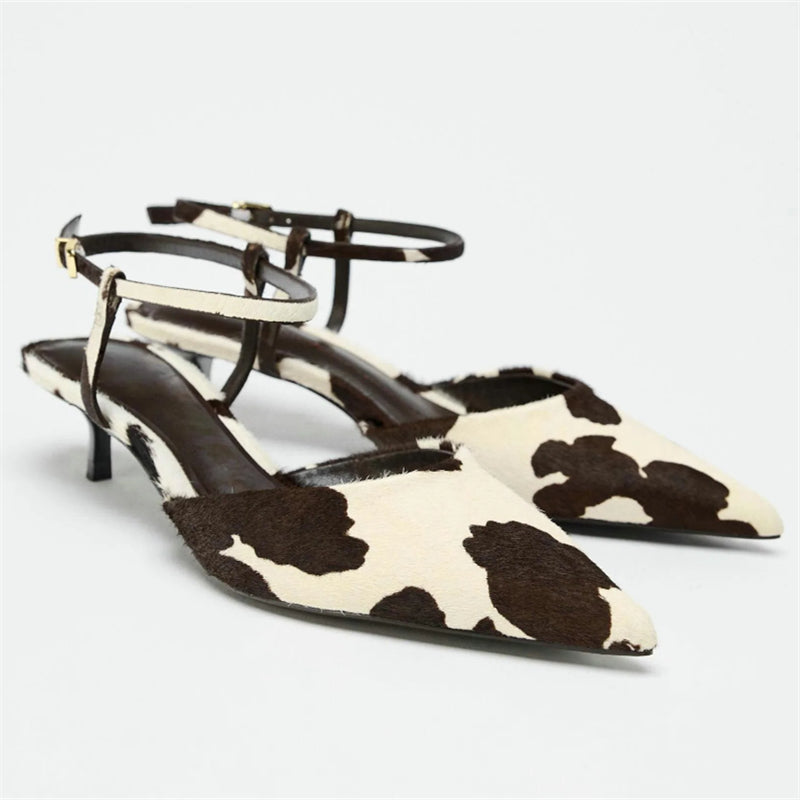 Women's genuine cowhide stitched pumps